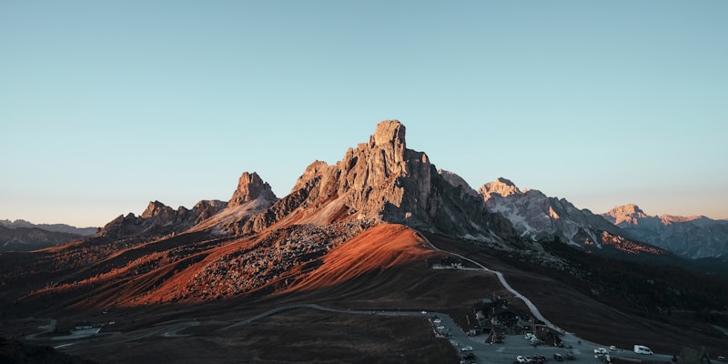 Sunset over desert highway during offline navigation trip